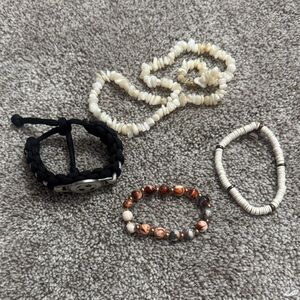 4 Bracelets and 1 Pooka Shell Necklace